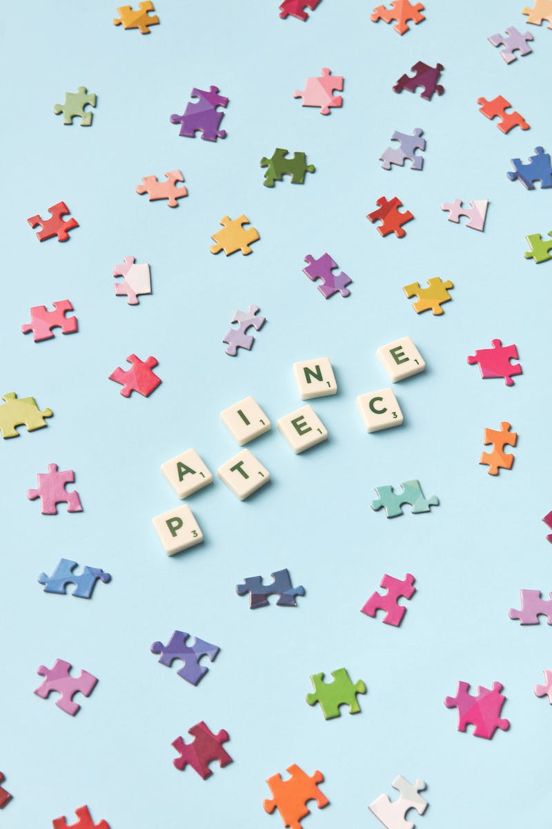 Colorful Puzzle Pieces With Scrabble Tiles